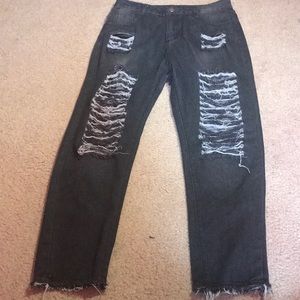 I am selling these ripped boyfriend jeans that are black/gray. Negotiatable.